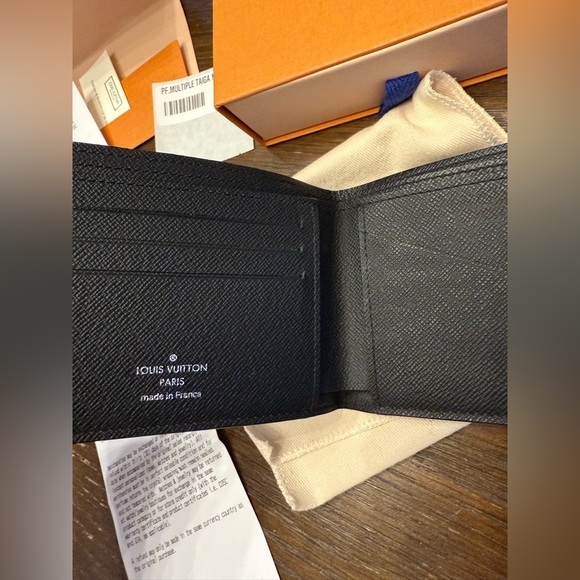 Authentic Louis Vuitton multiple wallet in Taiga Noir w/ receipt, jacket, & box - Picture 8 of 11